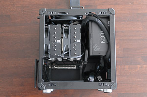 "The final build without side panels. Dual-tower CPU cooler in flipped orientation so it acts as an intake from the back."
