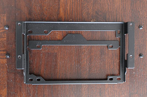 "PSU bracket with the SFX adapter -- think twice before removing it"