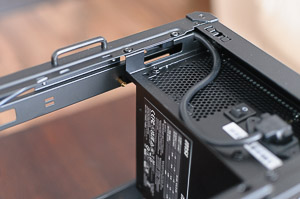 "ATX power cable routed through the case's frame"